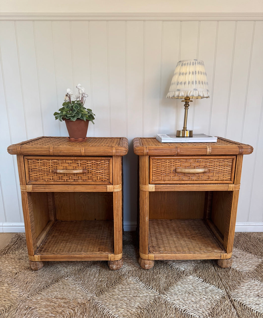 A pair of vintage rattan bedsides