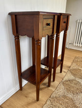 Load image into Gallery viewer, A pair of mahogany scalloped bedside tables
