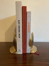Load image into Gallery viewer, A pair of vintage brass shell bookends
